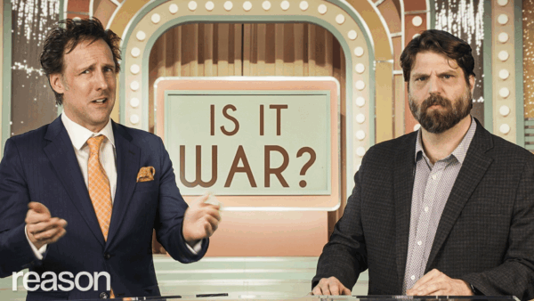 Two men standing on a TV set for a game show called Is It War | Adani Samat