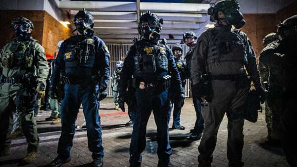 Department of Homeland Security officers | Credit: Benjamin Hanson/ZUMAPRESS/Newscom