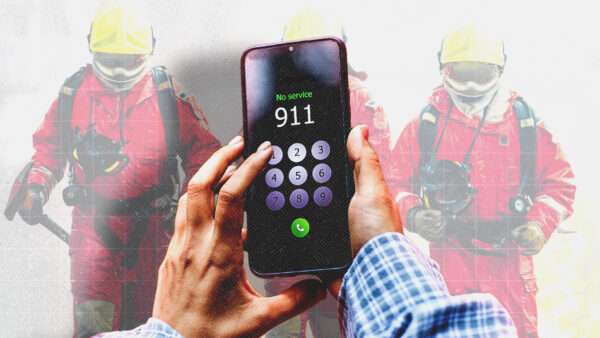 Emergency responders in the background, with a person holding an iPhone dialing 911 | Envato
