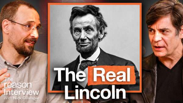 Damon Root appears on the left. Nick Gillespie appears on the right. A black and white image of President Abraham Lincoln appears in the center square. Bold text across the bottom of the screen reads "THE REAL LINCOLN." | Illustration: Adani Samat