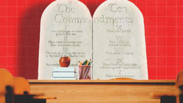 Red background, a desk, an apple stacked on books next to a pencil cup, and the Ten Commandments on stone tablets | Illustration: ESBBasics/Envato/erika8213/Envato