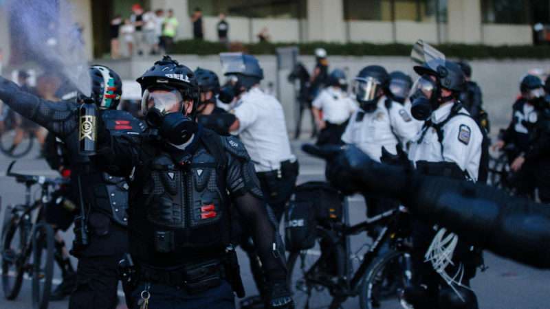 Columbus, Ohio, police officers use pepper spray on protesters near City Hall on May 29, 2020
