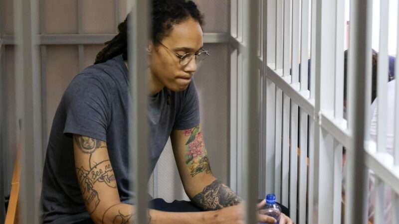 Brittney Griner sitting in a prision cell