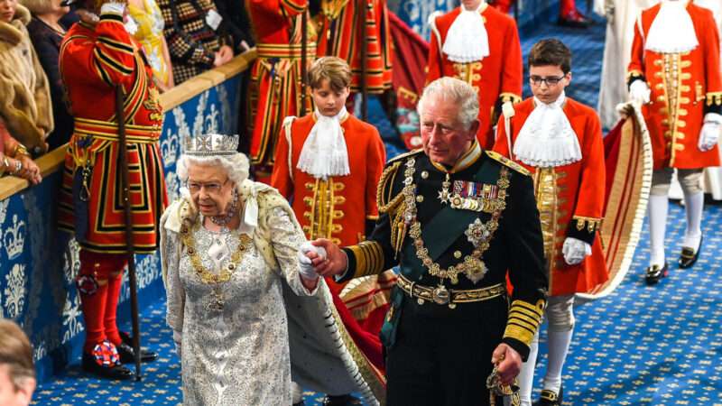 Queen Elizabeth II and then-prince of Wales Charles walking together at a royal ceremony. | Parsons Media / Polaris/Newscom