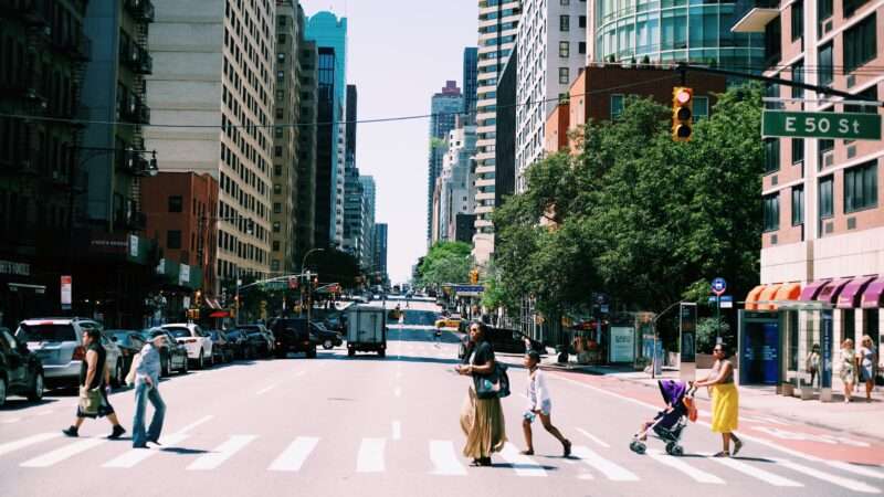 a city crosswalk during the day | Photo by Jesus Kiteque on Unsplash