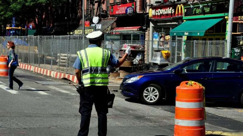 Cop directing traffic