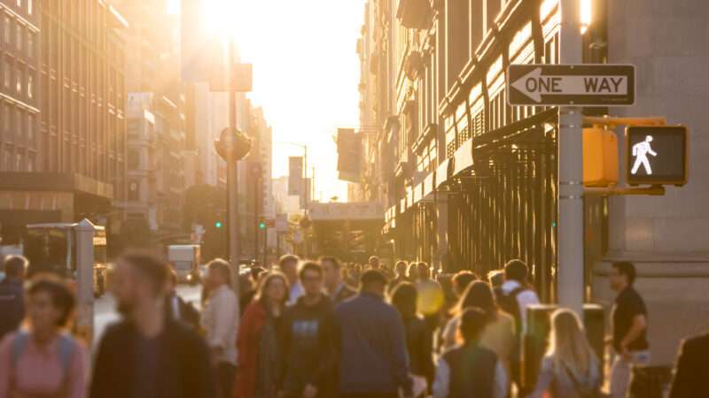 A crowd of people walk down the street in New York City | Photo 119798510 © Ryan Deberardinis | Dreamstime.com