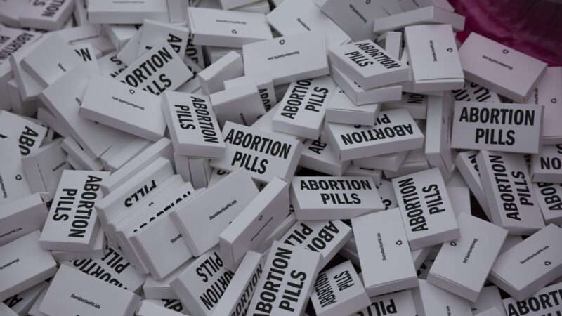 Boxes that say "Abortion Pills" and contain information about abortion-inducing drugs