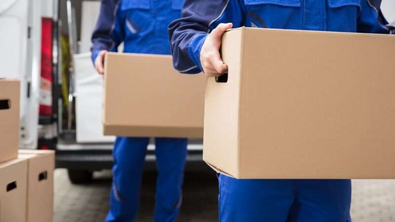 Men moving boxes | Andrey Popov | Dreamstime.com