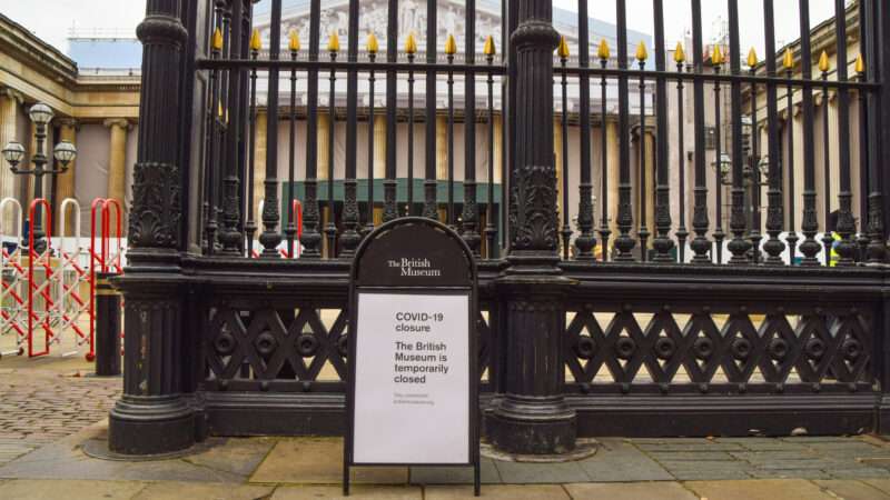 A sign at the entrance to the British Museum in London announces that it is temporarily closed due to the COVID-19 pandemic.