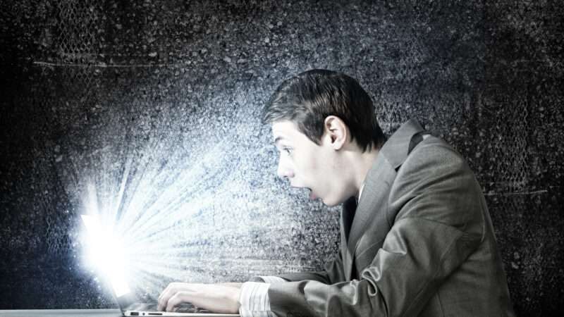man shocked by something on laptop screen | Ingram Publishing/Newscom
