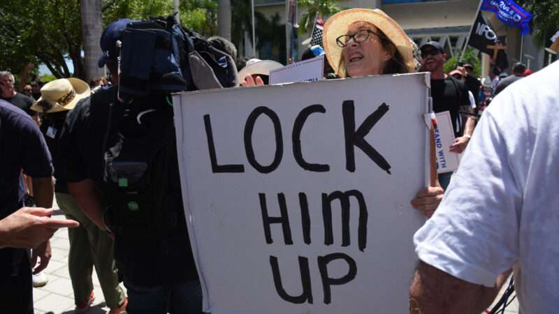 A protestor outside President Donald Trump's arraignment | Michele Eve Sandberg/Sipa USA/Newscom