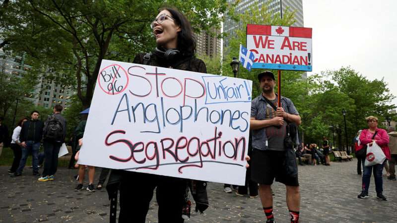 topicstravel | Photo: English-speaking opponents of Quebec’s French language Bill 96 protest in downtown Montreal, Quebec, on May 26, 2022; Christinne Muschi/Reuters