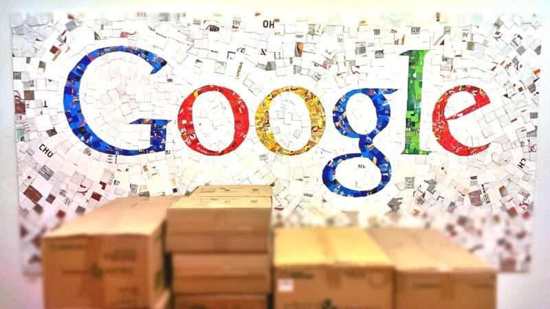 The google logo on a wall with packing boxes in front of it | Photo 35205367 © Serban Enache | Dreamstime.com