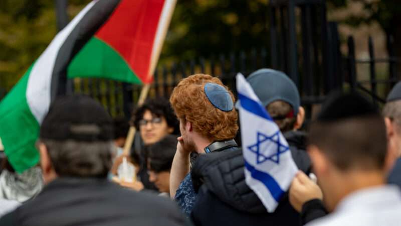 Student protesters hold the flag of Israel and the flag of Palestine | Michael Nigro/Sipa USA/Newscom