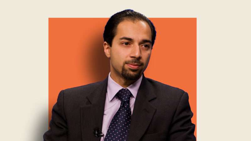 Trita Parsi in front of orange square background | Lex Villena