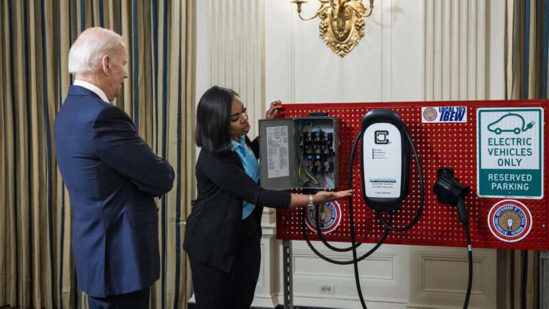 President Joe Biden watches an electric vehicle charger demonstration at the White House. | Jim LoScalzo - Pool via CNP/picture alliance / Consolidated News Photos/Newscom
