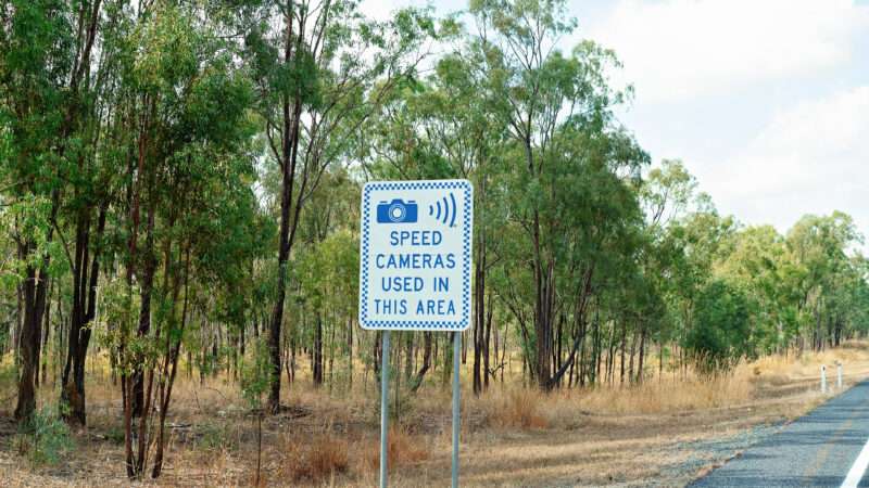 Speed camera sign on the side of the road | Photo 159057491 © Michele Jackson | Dreamstime.com