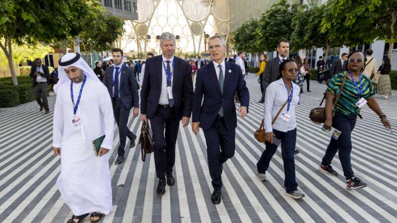 Attendees of the Cop28 climate conference in Dubai walking | NATO / Polaris/Newscom