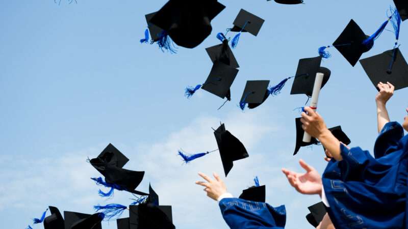 Graduates throwing their caps in the air | Hxdbzxy | Dreamstime.com