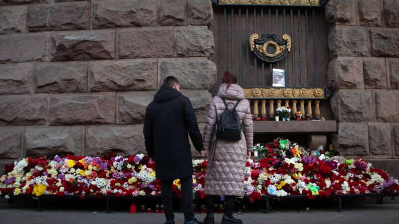 Two Russians mourn victims in Moscow concert hall attack | Artem Priakhin/SOPA Images/Sipa USA/Newscom
