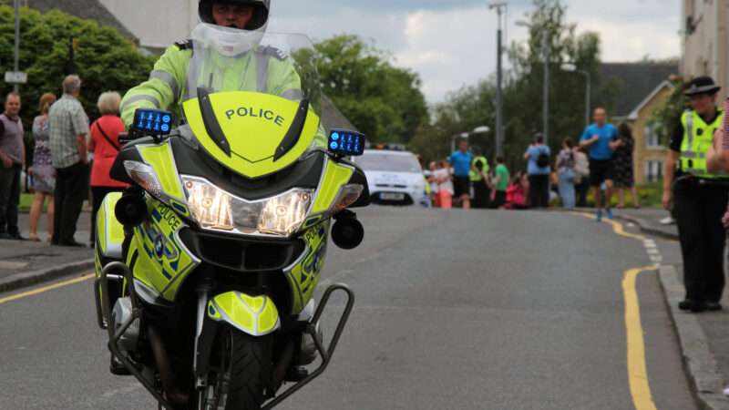 Police Scotland officer on a motorcycle. | John Messingham | Dreamstime.com