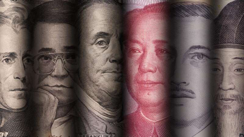 The faces of various historical world leaders as depicted on their respective countries' currency—including the dollar, yuan, baht, won, and piso—all in a row. | Dilok Klaisataporn | Dreamstime.com
