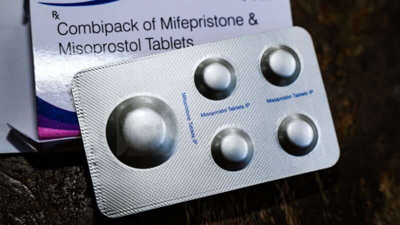 Packet of mifepristone and misoprostol tablets | Comstock image: DPST/Newscom; Pills: Soumyabrata Roy/ZUMAPRESS/Newscom