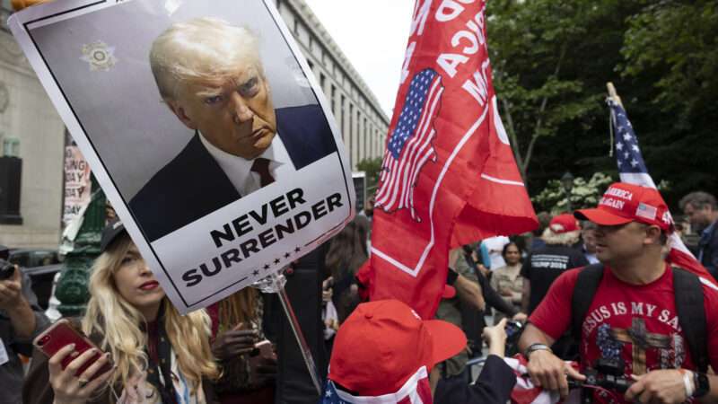 Pro-Trump protesters gather with signs and flags | Gina M Randazzo/ZUMAPRESS/Newscom