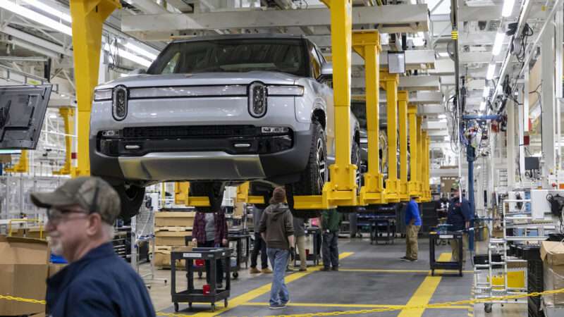 An assembly line of Rivian R1T pickup trucks, at its factory in Normal, Illinois. | Brian Cassella/TNS/Newscom