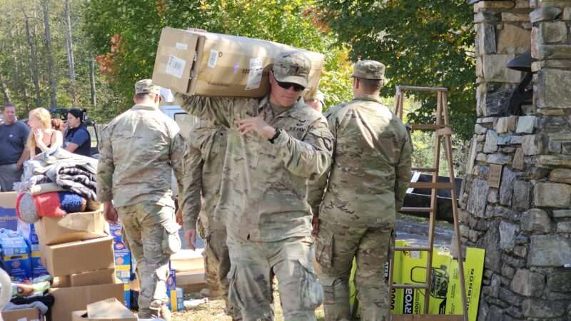 U.S. Army soldiers conduct door-to-door welfare checks in a local community in the wake of Hurricane Helene in western North Carolina. Oct. 8, 2024. | Polaris/Newscom