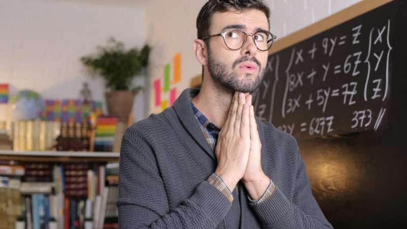 School teacher praying in classroom. | ID 224207695 © Alberto Jorrin Rodriguez | Dreamstime.com