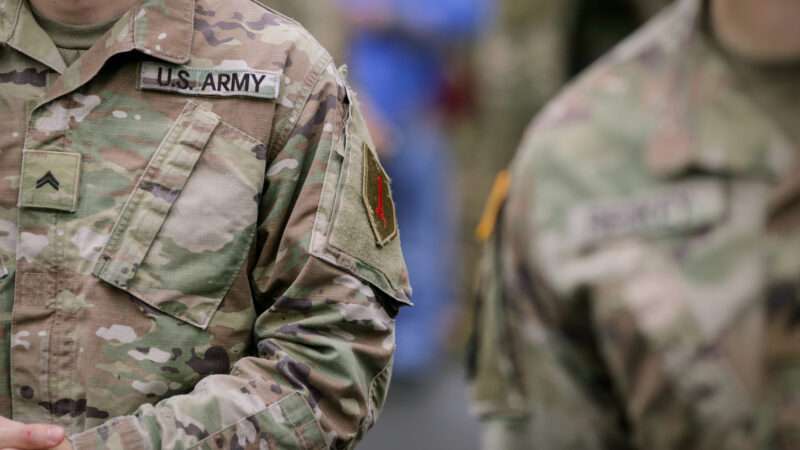 Close-up of U.S. Army soldiers' camouflage uniforms. | Cateyeperspective | Dreamstime.com