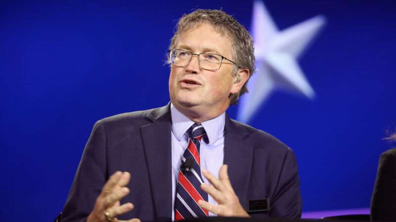 Rep. Thomas Massie speakers in front of a blue background with a white star | Gage Skidmore/ZUMAPRESS/Newscom