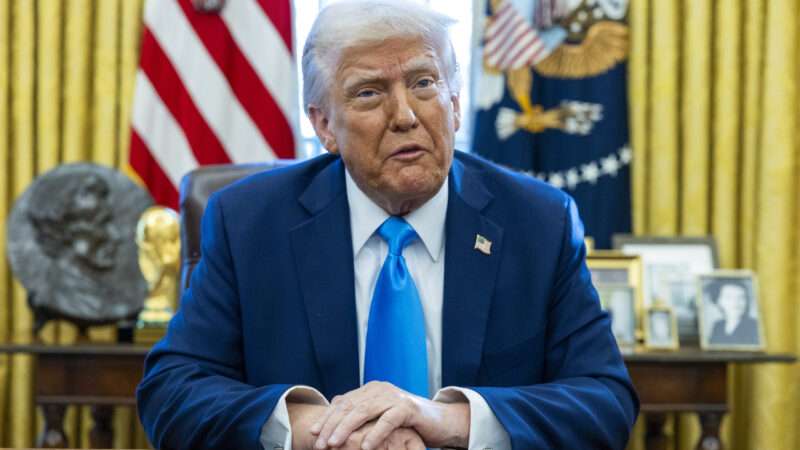 President Donald Trump at his desk in the Oval Office | Sipa USA/Newscom