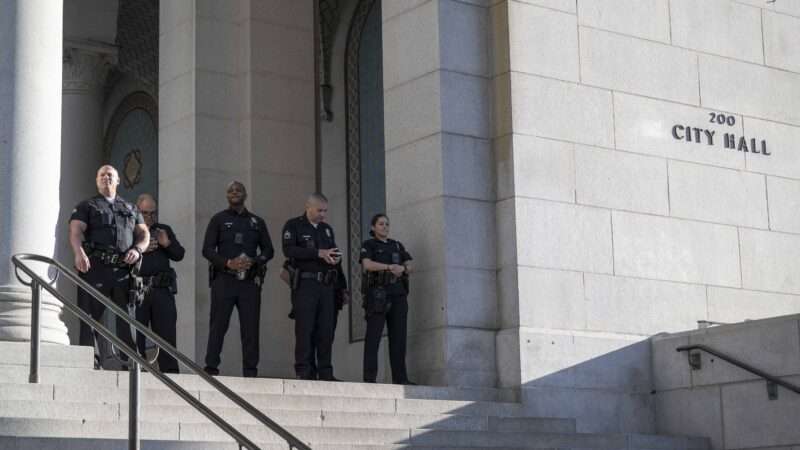 LAPD officers seen watching guard at City Hall on January 20, 2025. | Jon Putman/ZUMAPRESS/Newscom