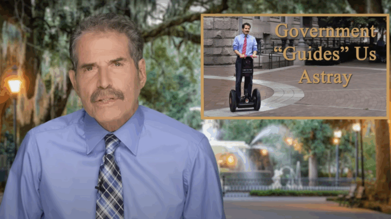 John Stossel is seen next to an image that says "Government 'Guides' Us Astray" | Stossel TV