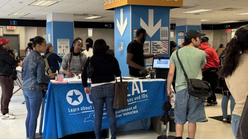 New York residents line up at the Department of Motor Vehicles (DMV) to apply for a REAL ID. | Niyi Fote/ZUMAPRESS/Newscom