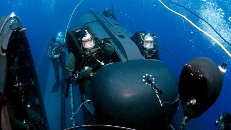 U.S. Navy SEAL divers prepare to launch a SEAL Delivery Vehicle during an exercise in the Atlantic Ocean in May 2005. | Andrew Mckaskle/ZUMA Press/Newscom