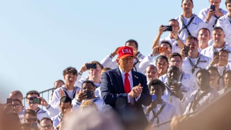 President Trump with U.S. military members | Tom Hudson/Sipa USA/Newscom