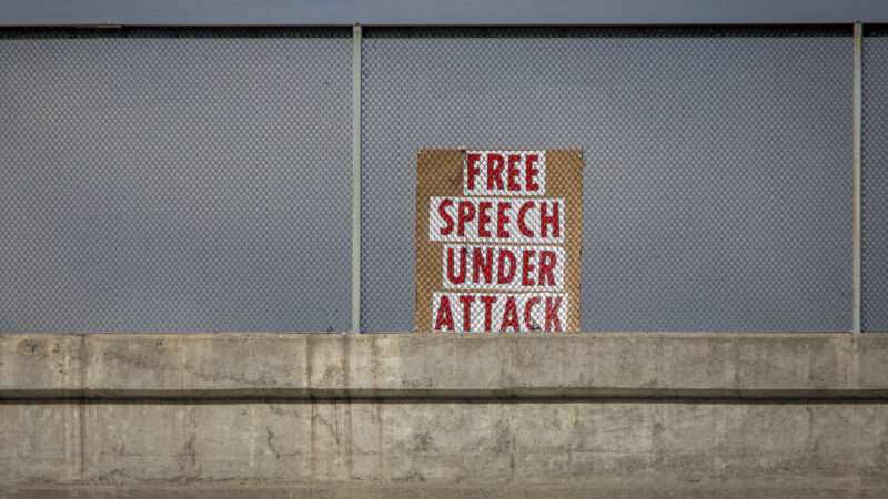 A protest sign saying "free speech under attack" sits above a highway overpass | ID <a href="https://www.dreamstime.com/political-protest-sign-stating-free-speech-under-attack-freeway-overpass-red-letters-image318434433">318434433</a> | <a href="https://www.dreamstime.com/photos-images/free-speech.html">Free Speech</a> ©  <a href="https://www.dreamstime.com/frank284_info">Frank Armstrong</a> | <a href="https://www.dreamstime.com/stock-photos">Dreamstime.com</a>