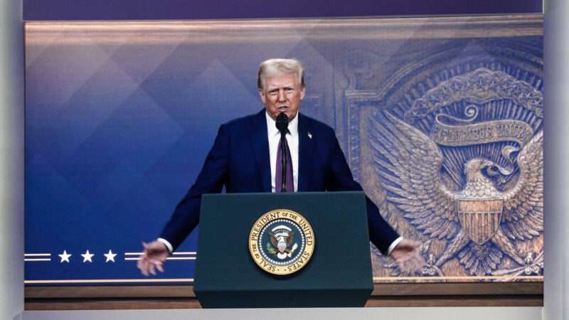 Donald Trump standing at a lectern with the presidential seal | Peng Ziyang / Xinhua News Agency/Newscom
