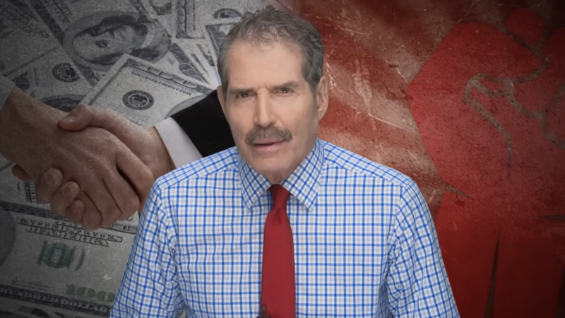 John Stossel stands in front of a handshake and a power sign | Stossel TV