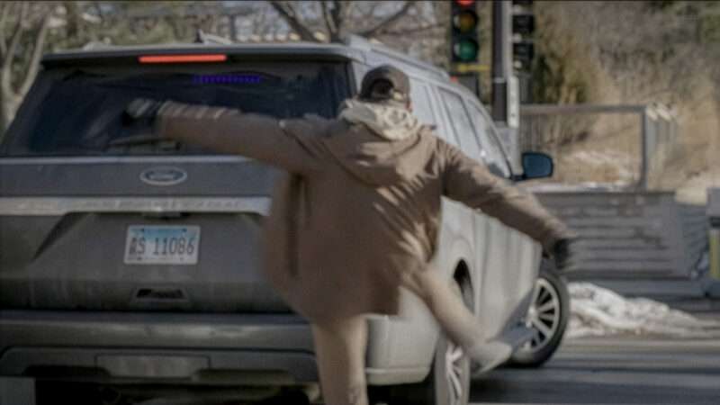 Alex Pretti kicking a federal agent's car | NBC News