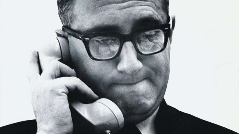A black and white photo of Henry Kissinger holding a phone to his ear | Photo: Henry Kissinger; Jack Robinson/Condé Nast/Getty