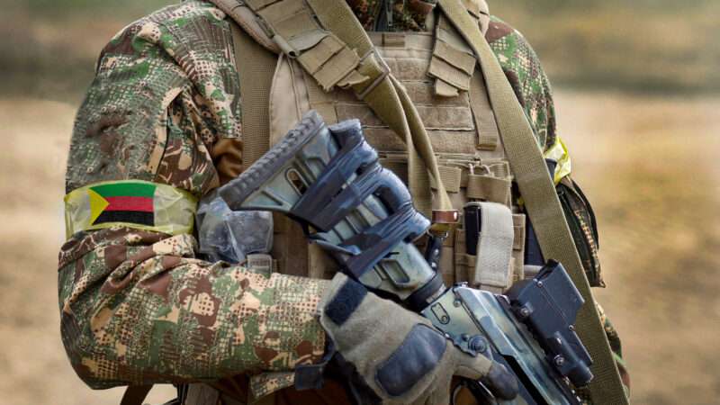 A soldier with a rifle and the flag of Azawad. | Photo: DPST/Newscom