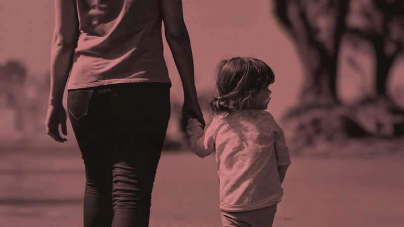 A mother holding the hand of her child | Princeton University Press