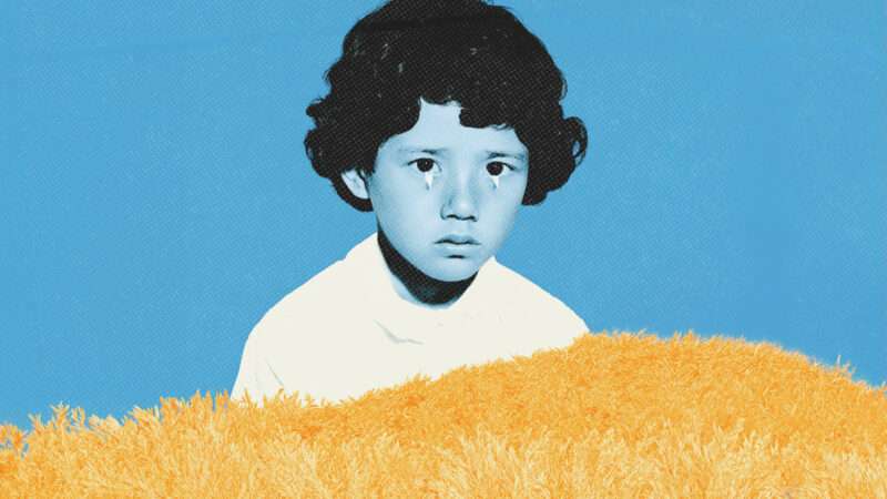 A child tinted blue against a blue background with golden rice at the bottom of the image | Midjourney