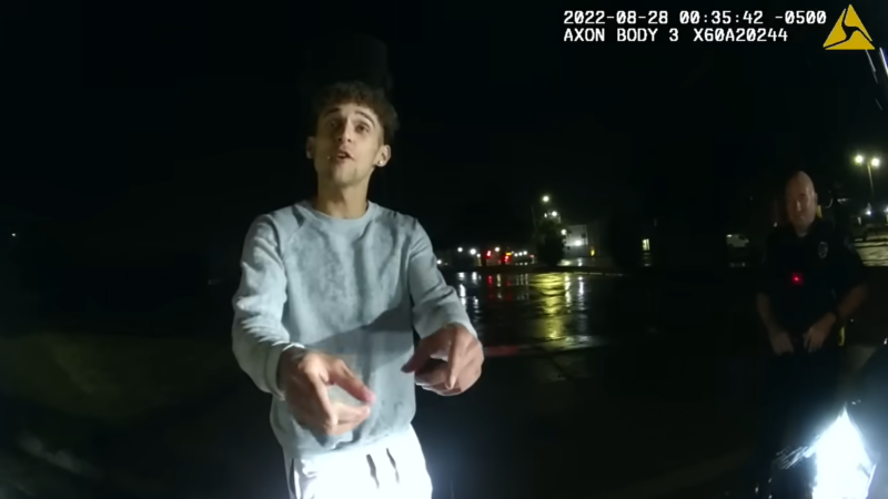 Screenshot from police body camera footage showing a man in pointing at the cop wearing the body camera | Body camera footage