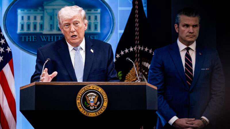 President Donald Trump addresses the press in the White House briefing room. Secretary of Defense Pete Hegseth stands nearby. | Mehmet Eser/Middle East Images/StringersHub/Sipa USA/Newscom